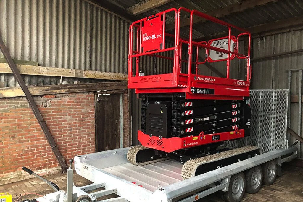 10m-Almac-scissor-lift-on-a-trailer