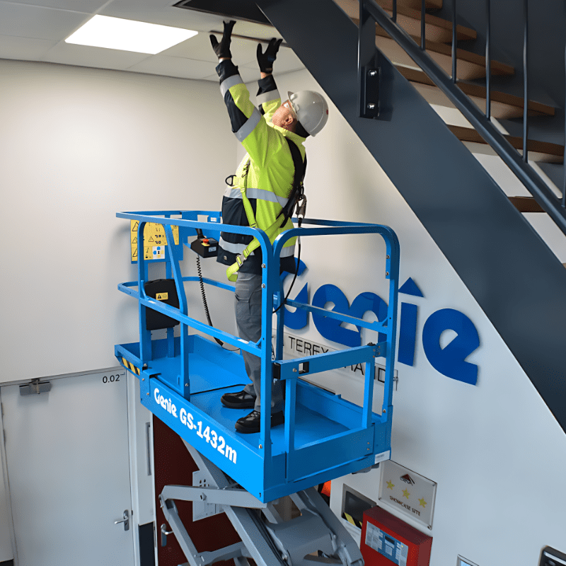 Ginie Lift being used for ceiling repair